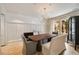 Bright dining room featuring a wooden table, chandelier, and large window at 2522 Habersham Nw Rd, Atlanta, GA 30305