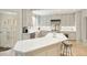 Gourmet kitchen with an island, custom cabinets, stainless steel appliances, and a farmhouse sink at 2522 Habersham Nw Rd, Atlanta, GA 30305