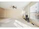 Bright living room featuring a fireplace and large windows at 4133 Royal Regency Nw Cir, Kennesaw, GA 30144