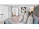 Spacious bedroom with plush bedding and large windows at 510 Oak Dr, Hapeville, GA 30354