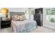 Bedroom with gray upholstered bed and TV at 510 Oak Dr, Hapeville, GA 30354