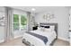 Bright bedroom with a comfortable bed and plenty of natural light at 510 Oak Dr, Hapeville, GA 30354