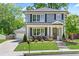 Two-story house with gray siding, white trim, and a landscaped lawn at 510 Oak Dr, Hapeville, GA 30354