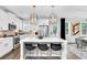 Modern kitchen with white cabinets, quartz countertops, and stainless steel appliances at 510 Oak Dr, Hapeville, GA 30354
