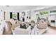 Open concept living room with hardwood floors and stylish seating arrangement at 510 Oak Dr, Hapeville, GA 30354