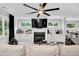 Relaxing living room features a sectional sofa, fireplace, and built-in shelving at 510 Oak Dr, Hapeville, GA 30354