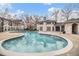 Community pool with a surrounding patio area at 970 Sidney Marcus Ne Blvd # 1301, Atlanta, GA 30324