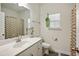 Clean bathroom with white vanity and shower/tub combo at 13136 Vista Ln, Covington, GA 30014
