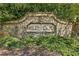 Stone entrance sign welcomes residents to Wildwood at 13136 Vista Ln, Covington, GA 30014