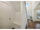 Bright entryway with built-in bench and hardwood floors at 13136 Vista Ln, Covington, GA 30014