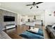 Spacious living room with hardwood floors and fireplace at 13136 Vista Ln, Covington, GA 30014