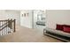 Upstairs hall with bench seating and bedroom access at 13136 Vista Ln, Covington, GA 30014