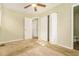 Spacious bedroom with carpet, ceiling fan, and ample closet space at 3218 Ward Sw Dr, Atlanta, GA 30354