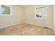 Spacious bedroom with neutral walls and carpeting, offering ample natural light at 3218 Ward Sw Dr, Atlanta, GA 30354