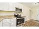 Modern kitchen with stainless steel appliances and granite countertops at 3218 Ward Sw Dr, Atlanta, GA 30354