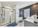 Modern bathroom with a shower, tub, and dark gray accent wall at 251 Ivy Chase Loop, Dallas, GA 30157