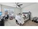 Cozy bedroom with a ceiling fan and natural light at 251 Ivy Chase Loop, Dallas, GA 30157