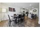 Modern dining room with dark wood table and six chairs at 251 Ivy Chase Loop, Dallas, GA 30157