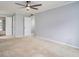 Spacious bedroom with neutral carpet and multiple doorways at 2901 Lenox Ne Rd # 506, Atlanta, GA 30324