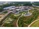 Aerial view of new construction community amenities with mini golf, walkways and common areas at 534 Sawnee Village Blvd # D65, Cumming, GA 30040
