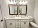 Modern bathroom with double vanity, sleek fixtures, and stylish accents at 534 Sawnee Village Blvd # D65, Cumming, GA 30040