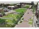 Aerial view of the community, showcasing its green spaces, retail areas, and street layout at 534 Sawnee Village Blvd # D65, Cumming, GA 30040