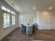 Bright dining area with large windows and modern lighting, perfect for Gathering meals and entertaining at 534 Sawnee Village Blvd # D65, Cumming, GA 30040