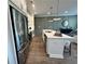 Modern kitchen featuring stainless steel appliances, a large island, and stylish pendant lighting at 534 Sawnee Village Blvd # D65, Cumming, GA 30040