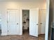 Convenient pantry with shelving provides ample storage space for groceries and household items at 534 Sawnee Village Blvd # D65, Cumming, GA 30040