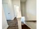 Well-lit stairway provides easy access to different floors of the house and hallways at 534 Sawnee Village Blvd # D65, Cumming, GA 30040