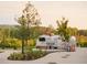 Tin Cup Grill Trailer with landscaping and trees surrounding it at 534 Sawnee Village Blvd # D65, Cumming, GA 30040