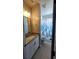Clean bathroom with a single vanity and shower at 857 Proctor Nw St, Atlanta, GA 30314
