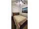 Cozy bedroom featuring a wood bed frame and patterned bedding at 857 Proctor Nw St, Atlanta, GA 30314