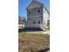 Two-story house with gray siding and white trim at 857 Proctor Nw St, Atlanta, GA 30314