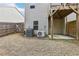 Backyard view showcasing the home's exterior and patio at 1000 Belfry Ter, Fairburn, GA 30213