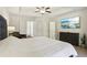 Main bedroom with mounted TV and ample closet space at 1000 Belfry Ter, Fairburn, GA 30213