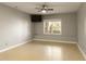 Spacious bedroom with light grey walls, ceiling fan, and wood-look flooring at 1211 Grand View Se Dr, Mableton, GA 30126