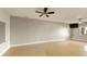 Spacious bonus room with ceiling fan and hardwood floors at 1211 Grand View Se Dr, Mableton, GA 30126