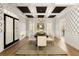 Formal dining room with geometric wallpaper and chandelier at 1211 Grand View Se Dr, Mableton, GA 30126