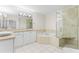 Elegant bathroom with soaking tub, walk-in shower, and double vanity at 211 Colonial Homes Nw Dr # 1105, Atlanta, GA 30309