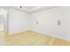 Spacious bedroom with hardwood floors and access to a bathroom at 211 Colonial Homes Nw Dr # 1105, Atlanta, GA 30309