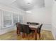 Formal dining room featuring hardwood floors and a modern light fixture at 211 Colonial Homes Nw Dr # 1105, Atlanta, GA 30309