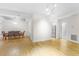 Bright dining room with hardwood floors and a table for six at 211 Colonial Homes Nw Dr # 1105, Atlanta, GA 30309