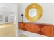 Bright entryway with built-in storage and a large circular mirror at 211 Colonial Homes Nw Dr # 1105, Atlanta, GA 30309