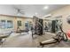 Well-equipped fitness center with treadmills, weights, and mirrored wall at 211 Colonial Homes Nw Dr # 1105, Atlanta, GA 30309