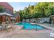 Community pool with plenty of lounge chairs at 211 Colonial Homes Nw Dr # 1105, Atlanta, GA 30309