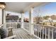 Private balcony with white railing and neighborhood views at 6229 Grand Loop Rd, Sugar Hill, GA 30518