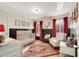 Bedroom with crib, armchair, and Hogwarts-themed wall at 6229 Grand Loop Rd, Sugar Hill, GA 30518