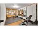 Well-equipped home gym featuring weightlifting equipment and cardio machines at 6229 Grand Loop Rd, Sugar Hill, GA 30518