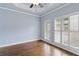 Hardwood floor bedroom with plantation shutters at 818 Highland Green Ne Way # 818, Atlanta, GA 30306